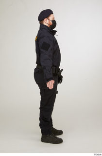 Photos Michael Summers Cop A pose detail of uniform standing…